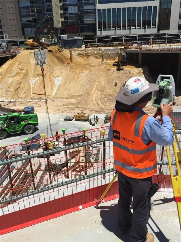 Settlement monitoring survey using total station on a construction site for structural and deformation monitoring